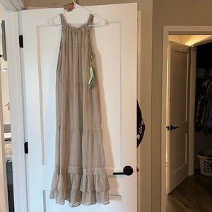 BRAND NEW 
Creme/Light Brown Trinhnology Dress… BRAND NEW W TAGS STILL ON!!